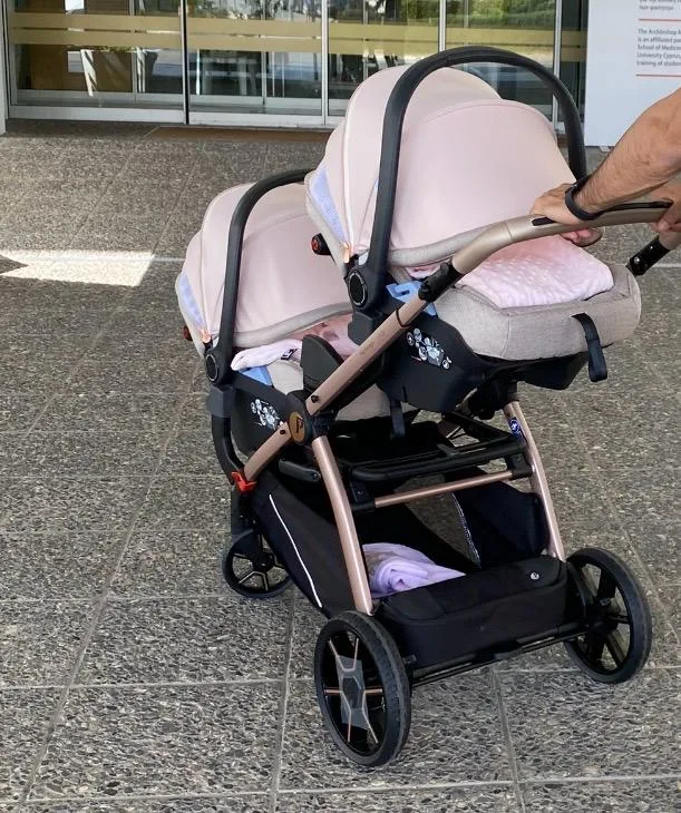 For sale double stroller with car seats